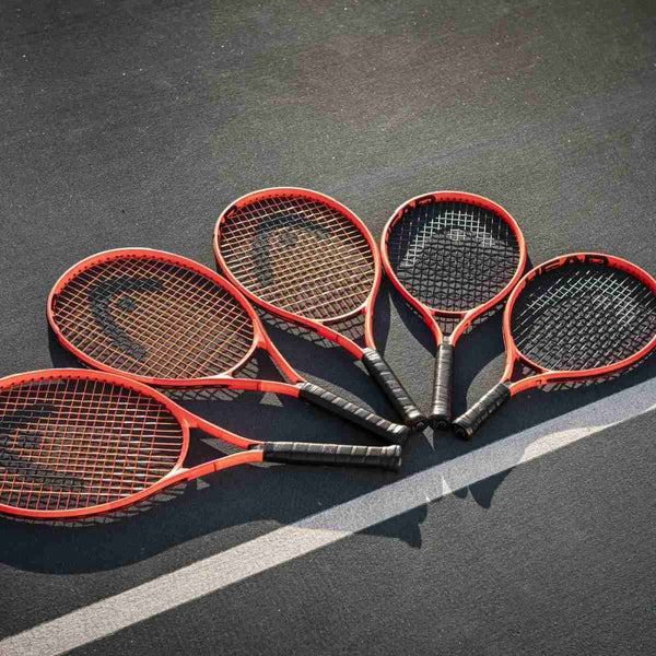 HEAD Radical Junior 26 Strung Tennis Racquet – 245 Grams, Grip Size 00 (3 7/8), Age 9–11 Years | Lightweight Graphite Composite Kids Tennis Racket | Orange/Black